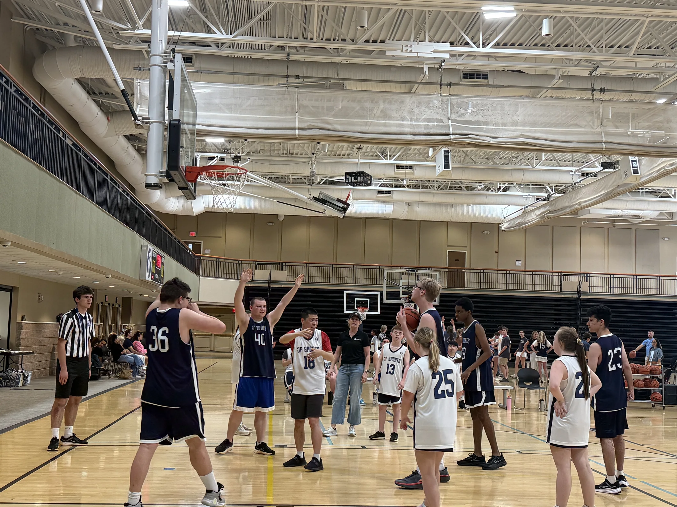 Tommy and his teammates in position during a basketball game